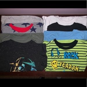 Bundle of 2T boy shirts.